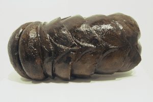 Larva, cast stone, shellac. 16 in x 8 in x 10 in.