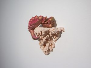 photo of sculpture on a wall
