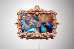 Video display in a sculptural frame